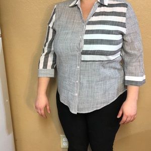 Gray and white striped shirt.